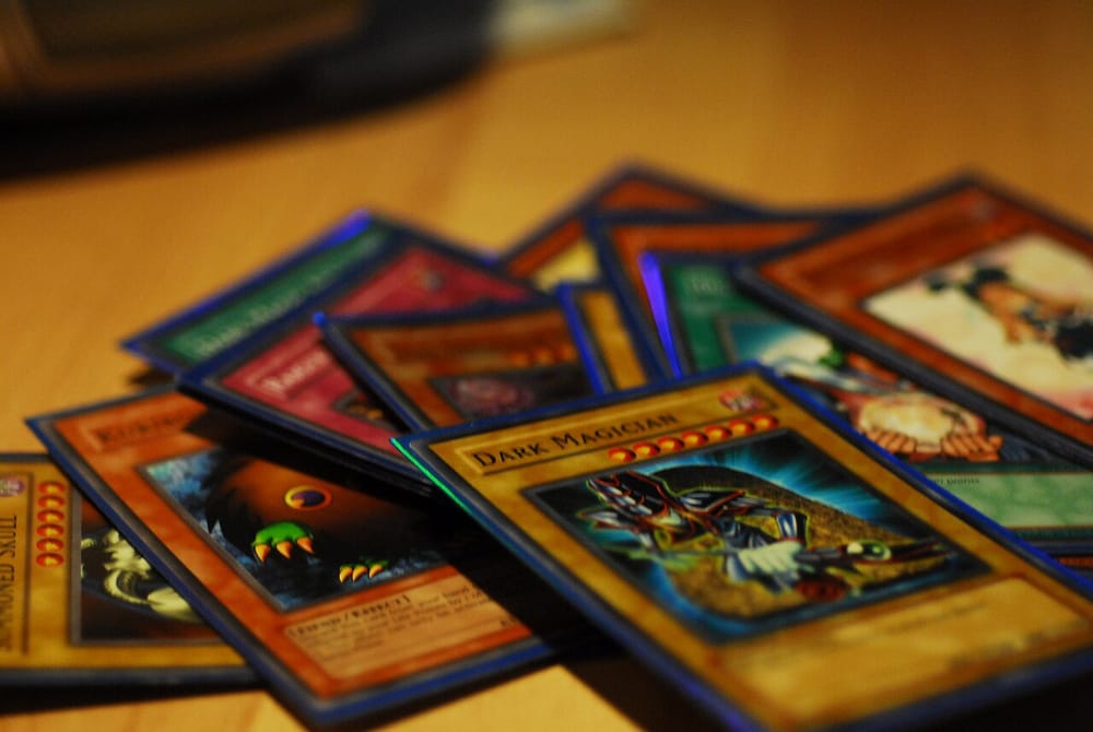 Yu-Gi-Oh! trading cards prepared for grading during the 25th anniversary collecting cycle.